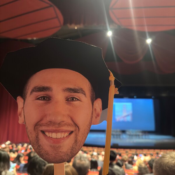Graduation Face on a Stick