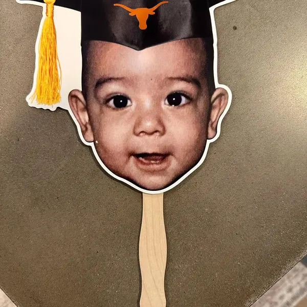 Graduation Face on a Stick