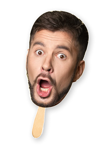 Cardboard cutout of a man's face on a popsicle stick against a white background