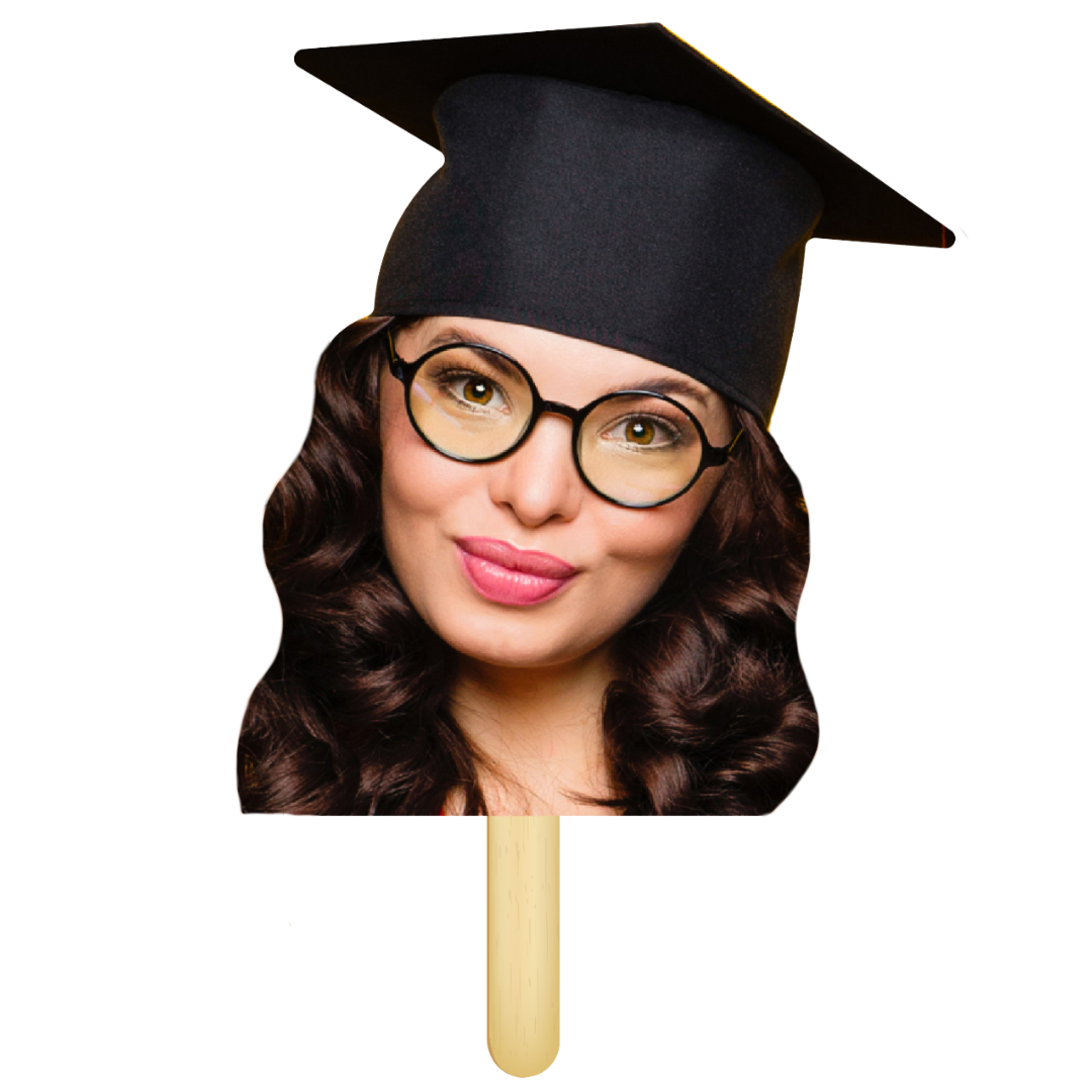 Graduation-themed mask with a woman's face wearing glasses and a cap on a stick against a white background.